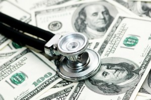 Orange County Accident Attorney - stethoscope over the dollar bills